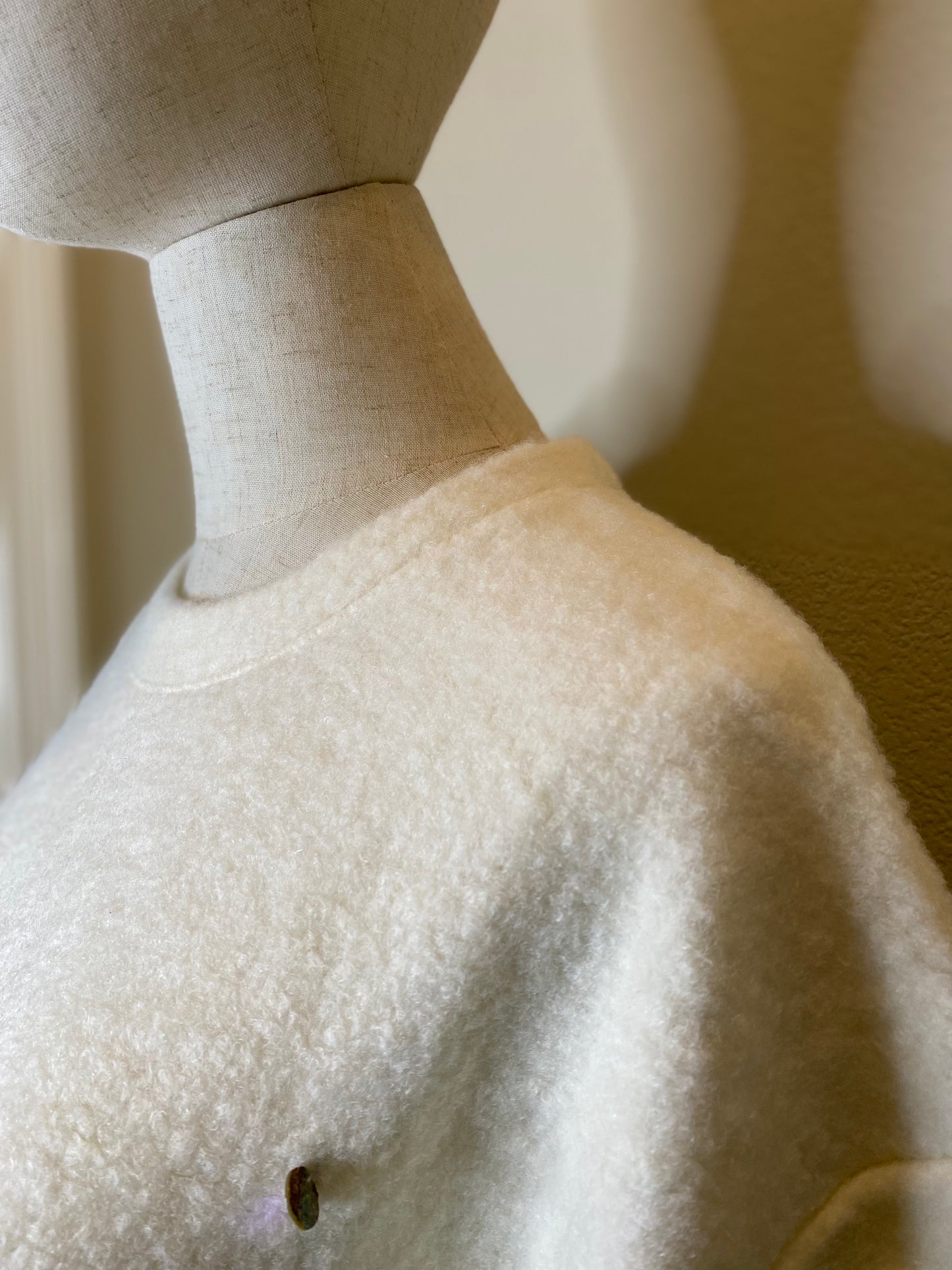 white sweater