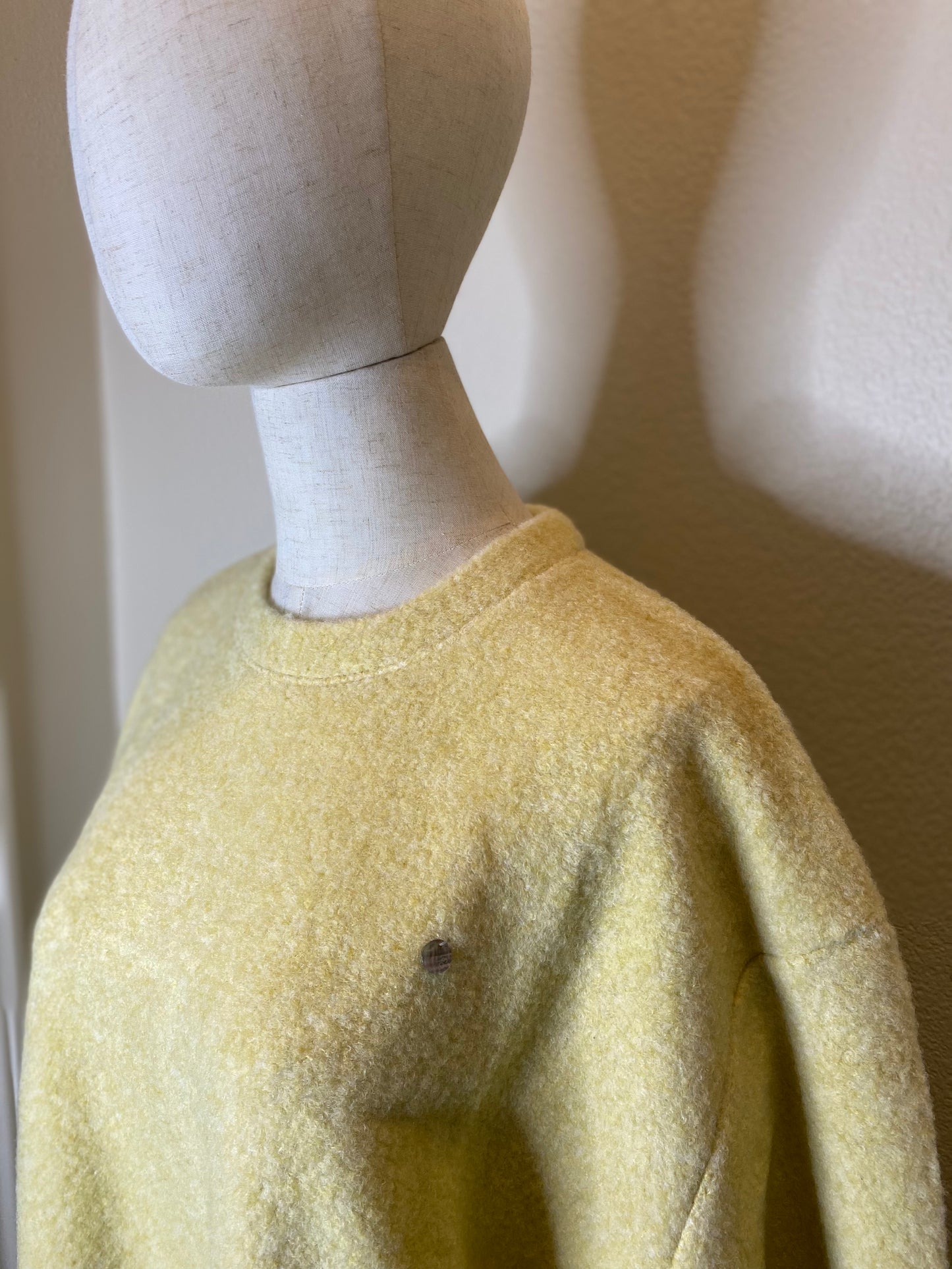 yellow sweater