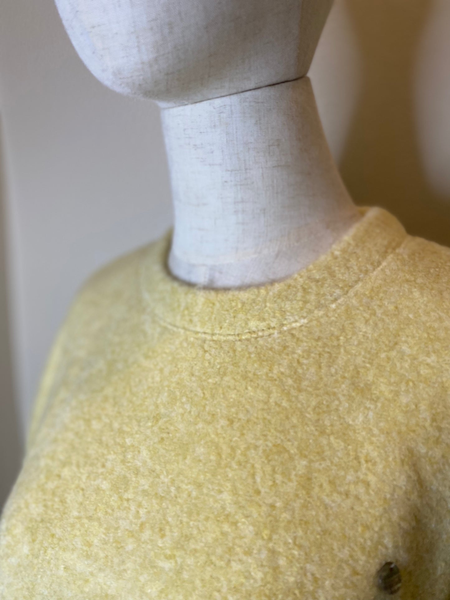 yellow sweater
