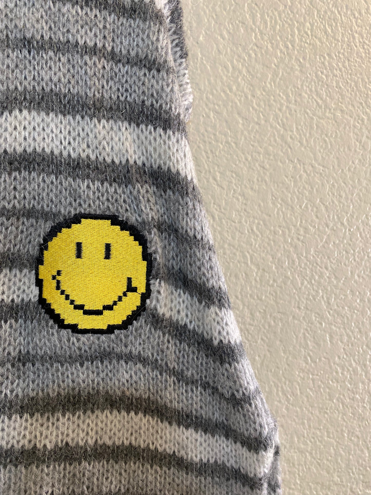 happy face sweater