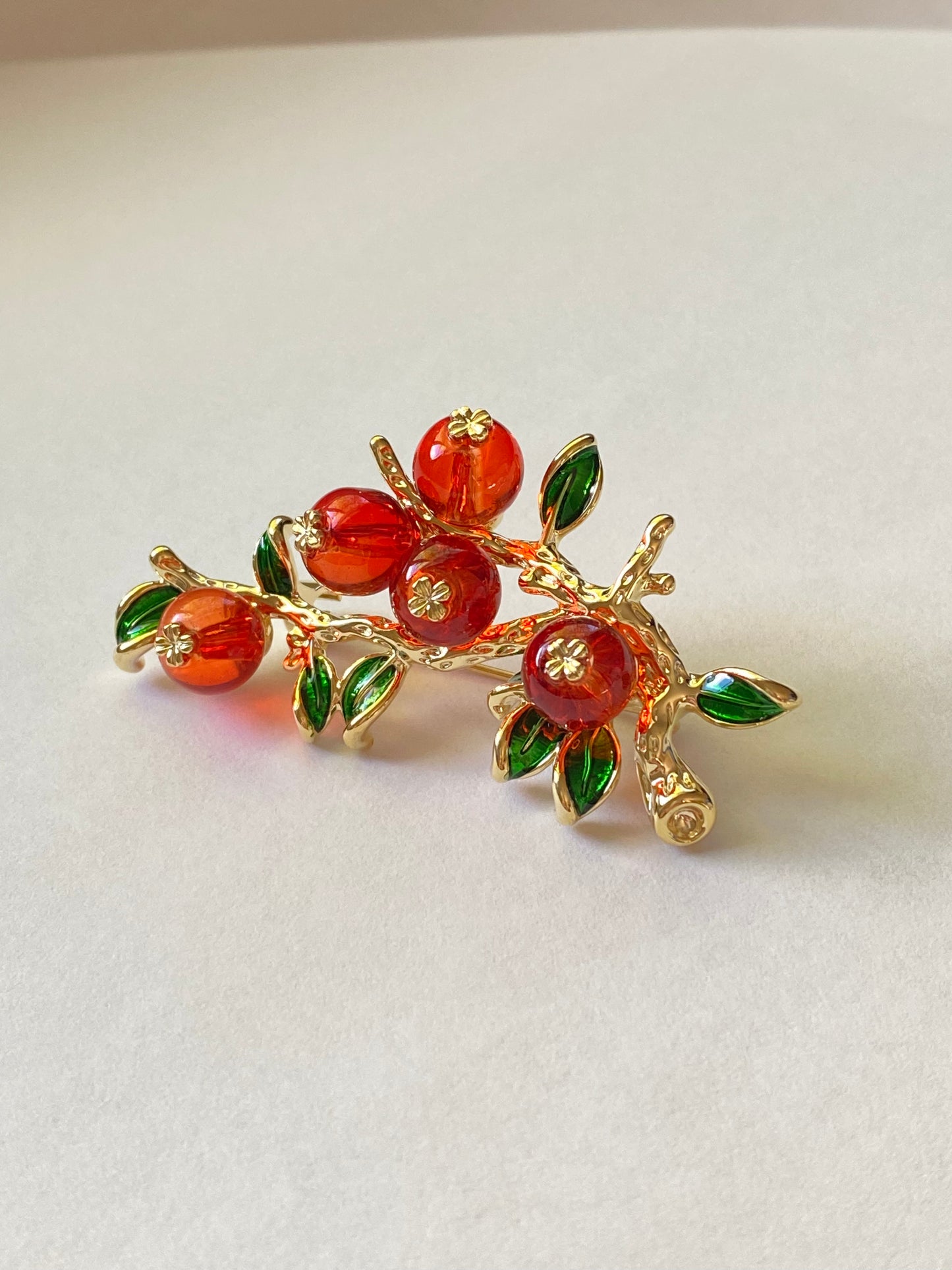 Persimmon brooch pin